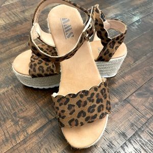 Women’s leopard platform shoes. Size 6.5 2.5”heel.